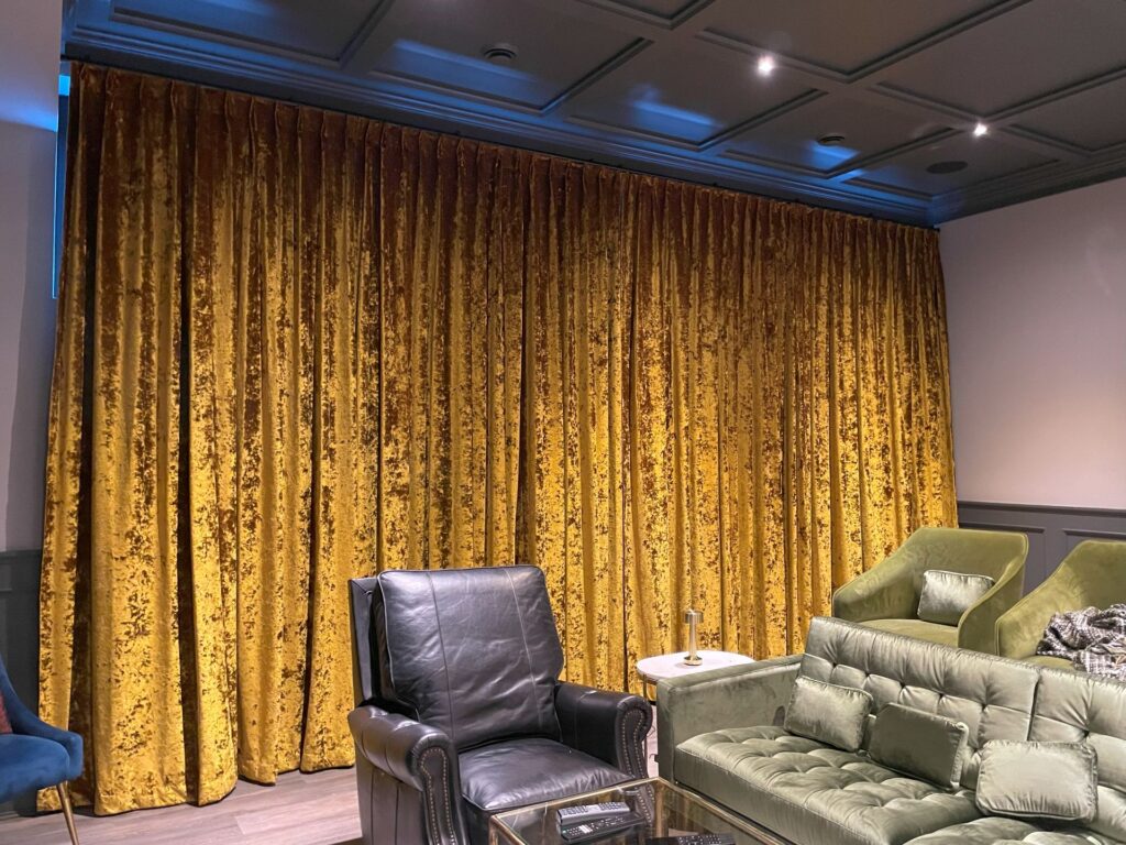 Media room with crushed velvet drapery