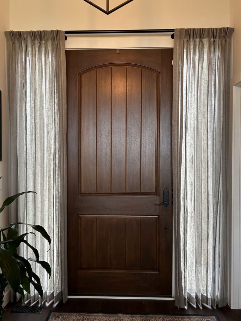 Front door with a creative drapery solution